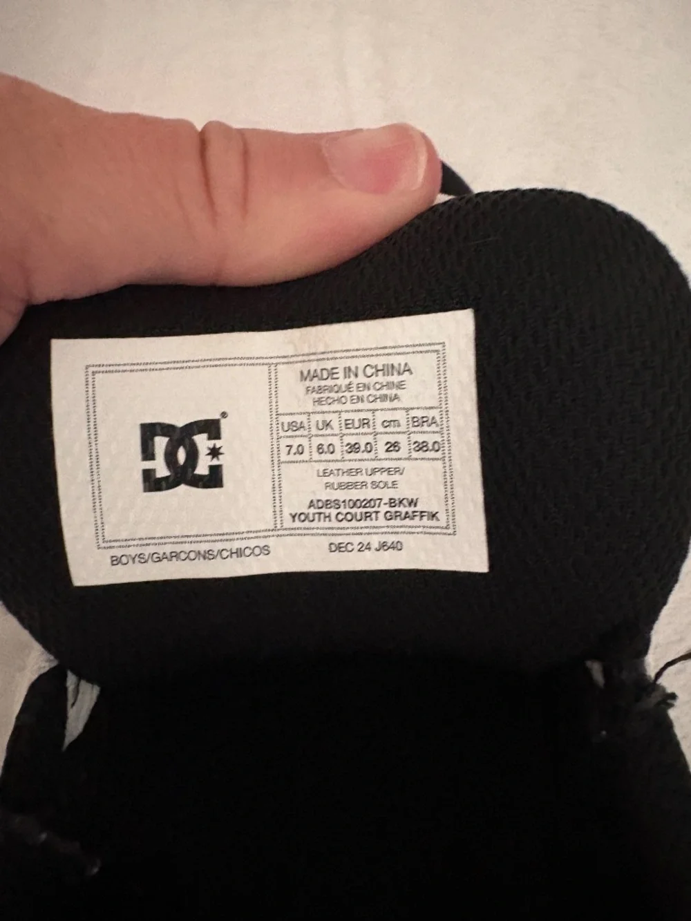 DC Shoes black sneakers with white star logo